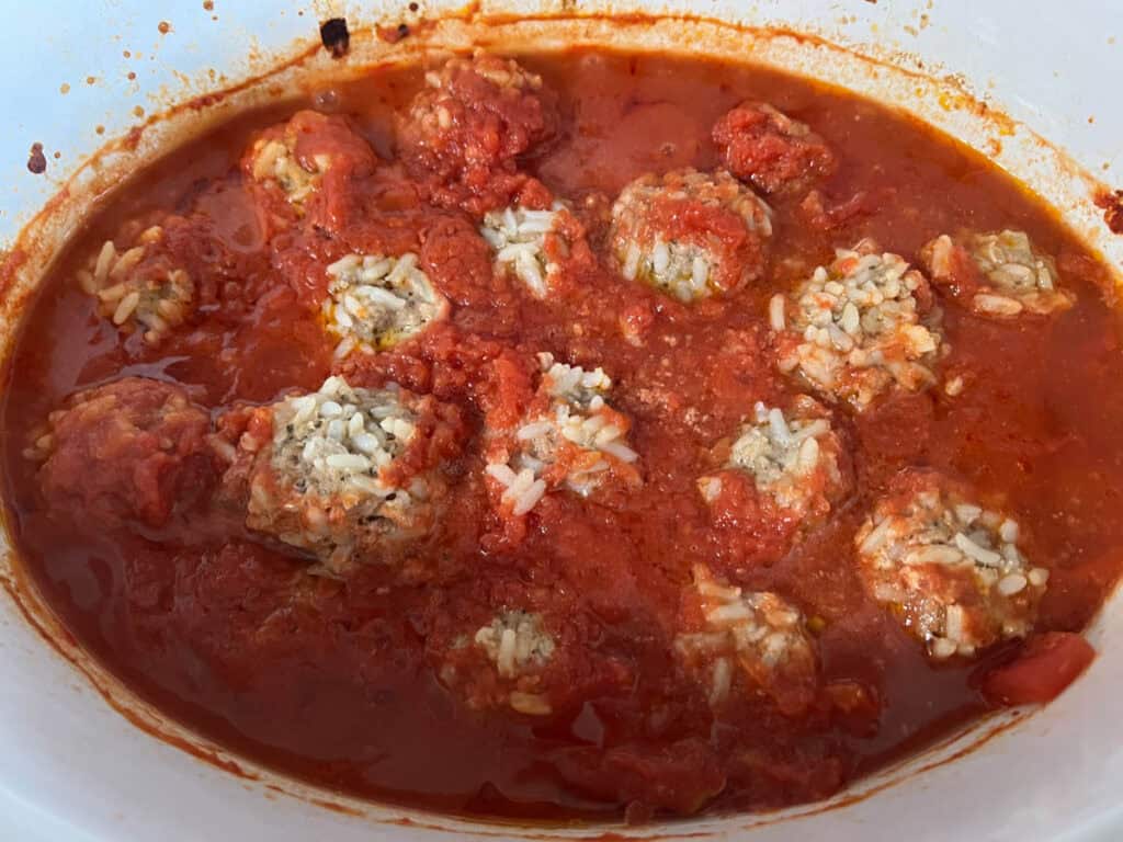 Scoop the cooked meatballs out of the sauce