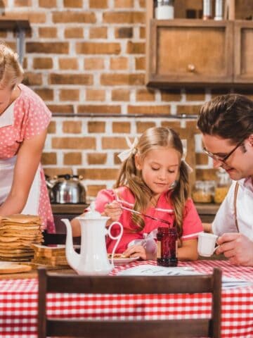 Vintage-styled family having a meal together.