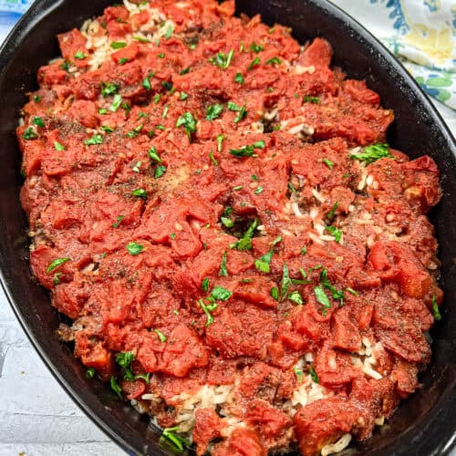 Shipwreck casserole on a black casserole dish.