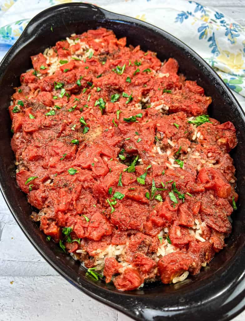 Shipwreck casserole on a black casserole dish.