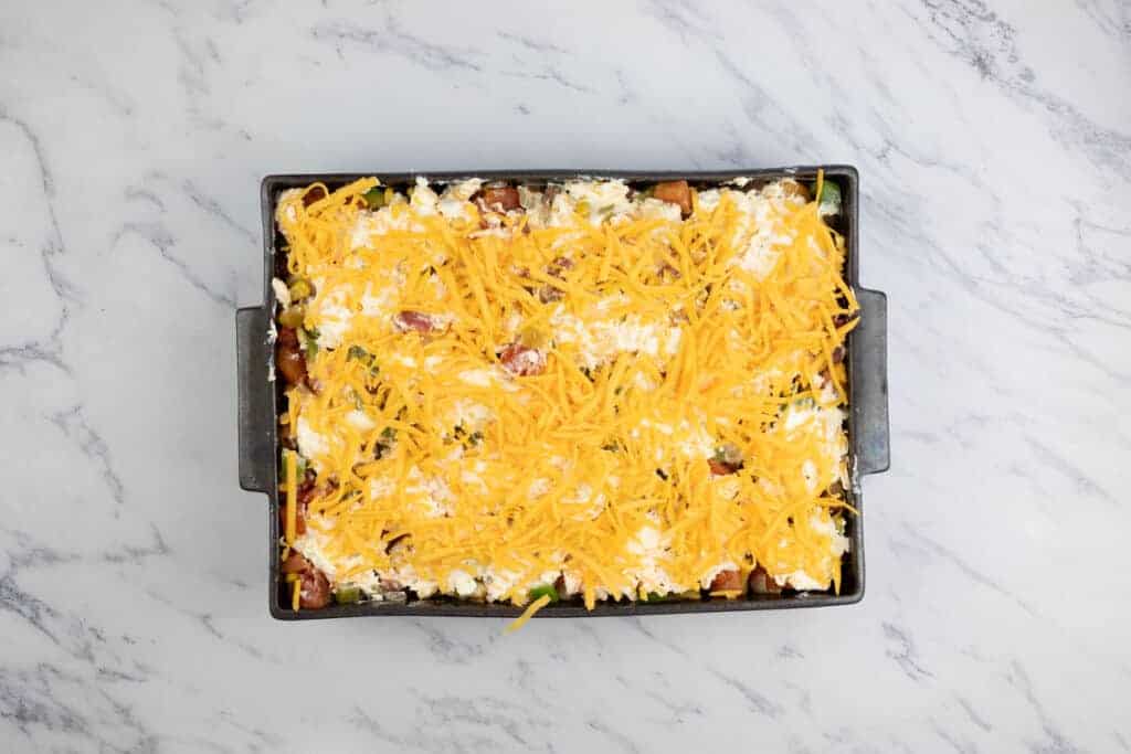 Top with cheddar and bake.