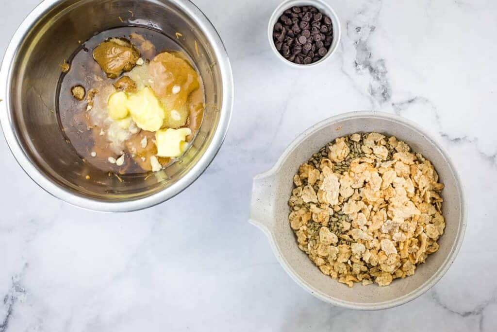 Mixed dry ingredients and mixed wet ingredients in bowls.