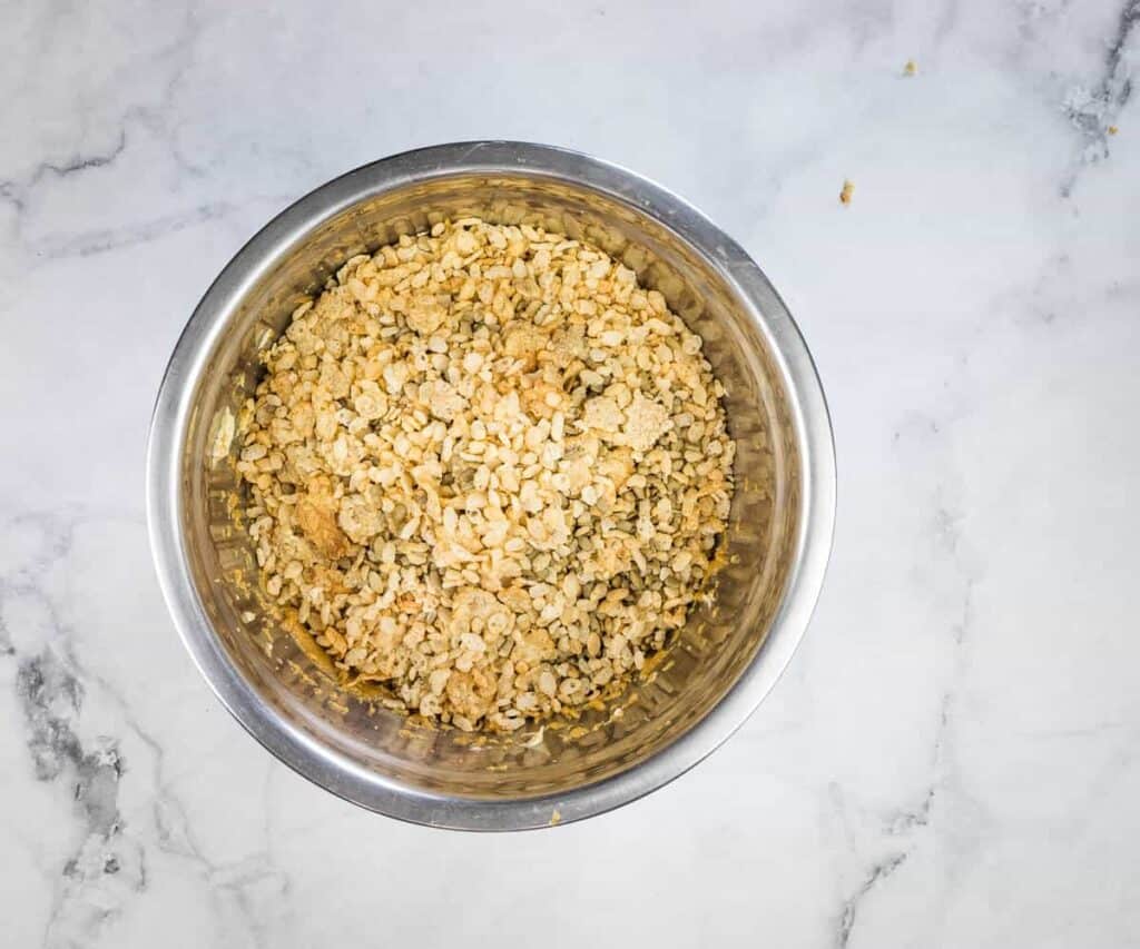 Wet and dry ingredients combined in a bowl.