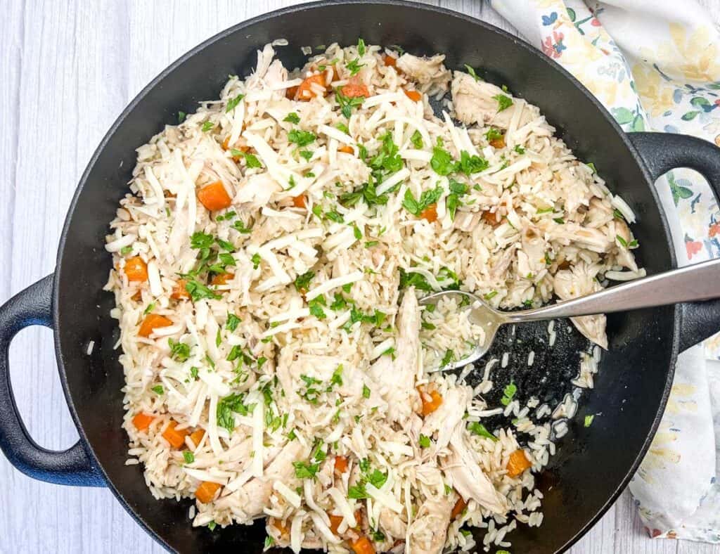 Top-down shot of chicken bog on a skillet.