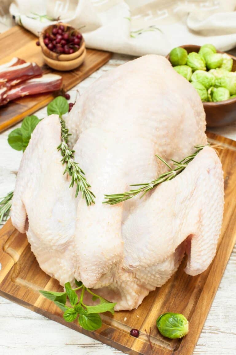 Whole raw turkey ready to go into the oven.