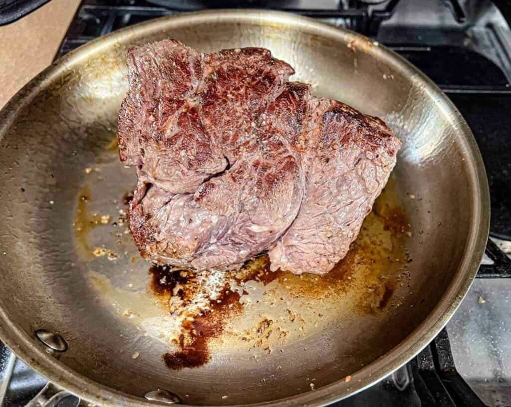 Sear the meat on all sides until nicely browned.