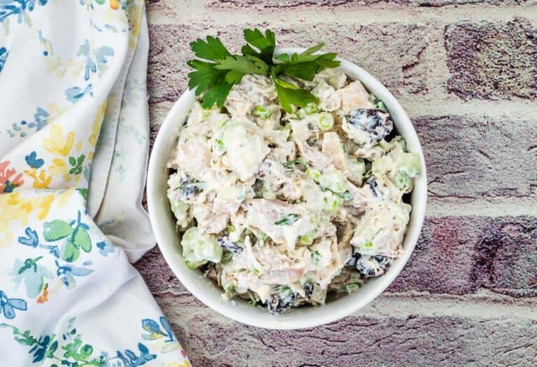 Turkey Salad with Cranberries & Walnuts in a white bowl.