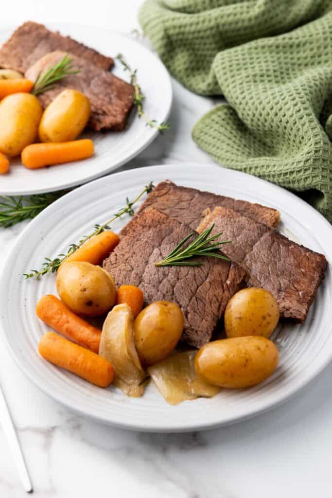 Crockpot Slow Cooker Rump Roast on a white plate.