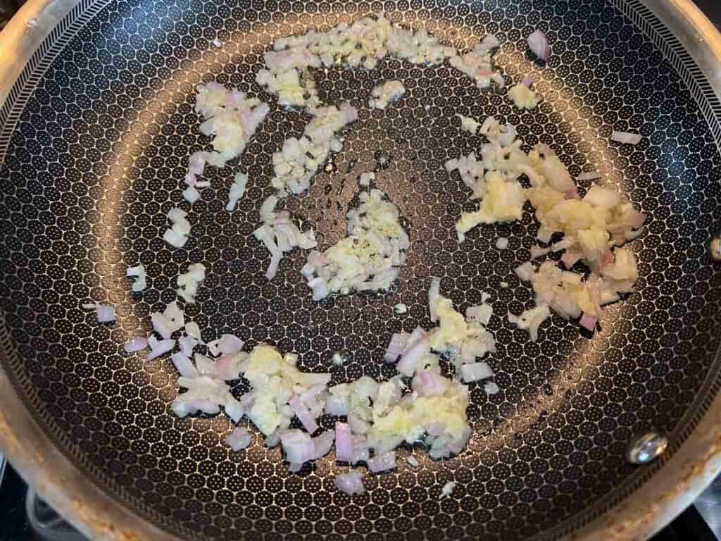 Cook shallots then add the minced garlic.