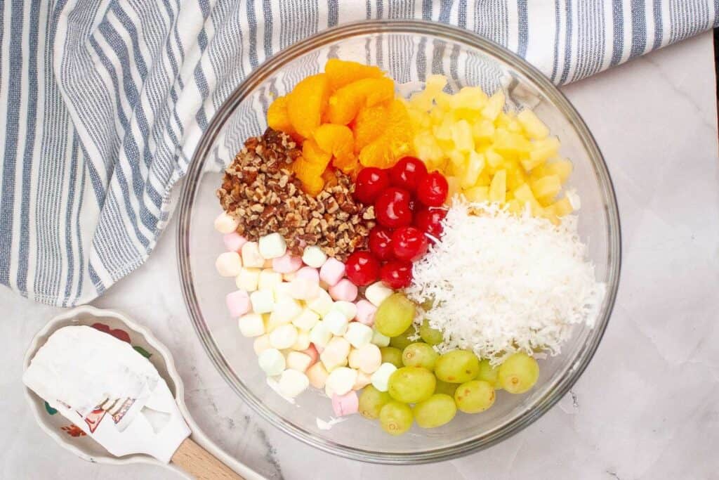 A colorful Ambrosia Salad in a bowl.