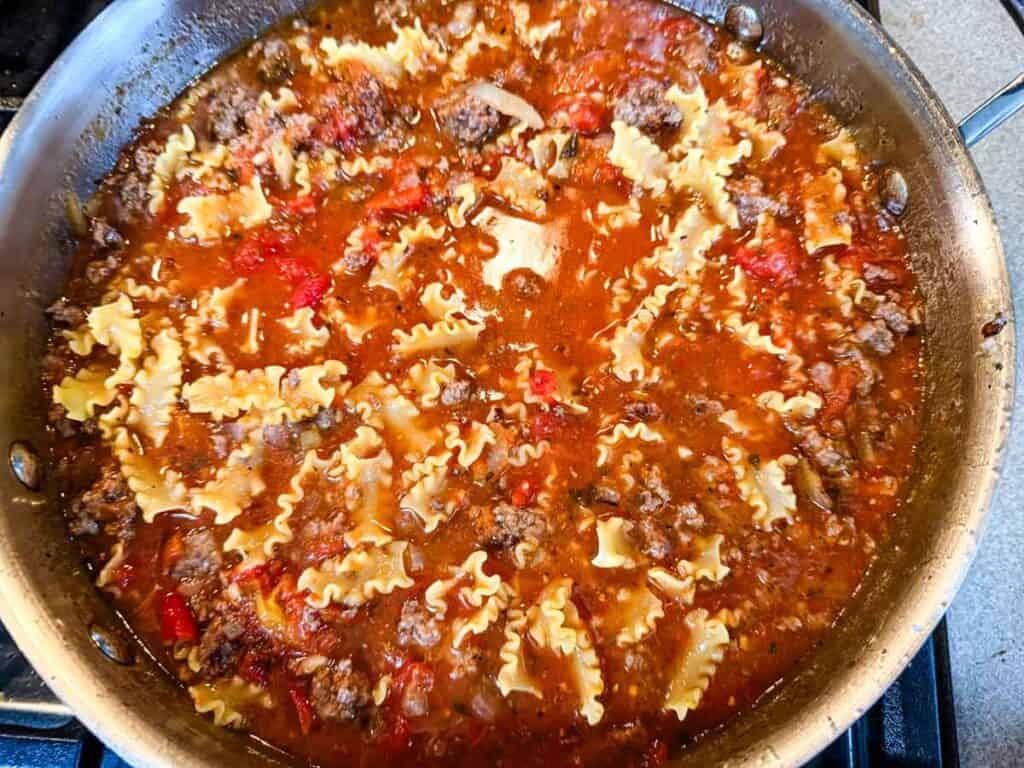 Simmering Skillet Lasagna on a stovetop.