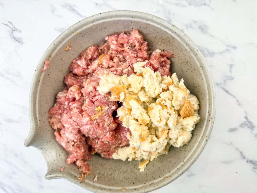 Mixture of meatball ingredients in a small bowl.
