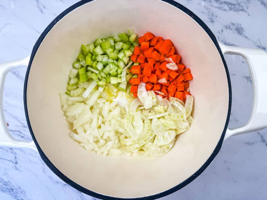 Saut&eacute;ing the vegetables in cooking pot.