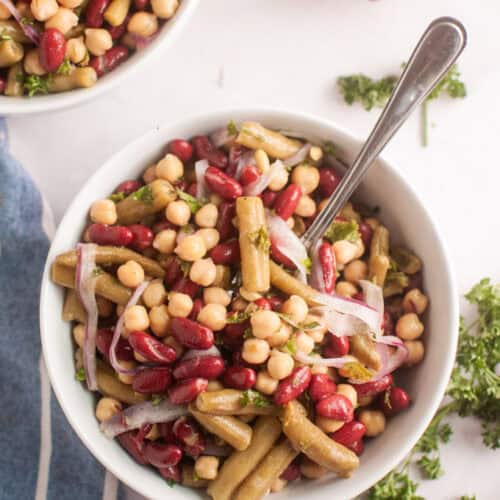 Three Bean Salad on a white bowl.
